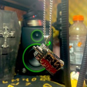 Cigarette pendant and chain with bottle opener